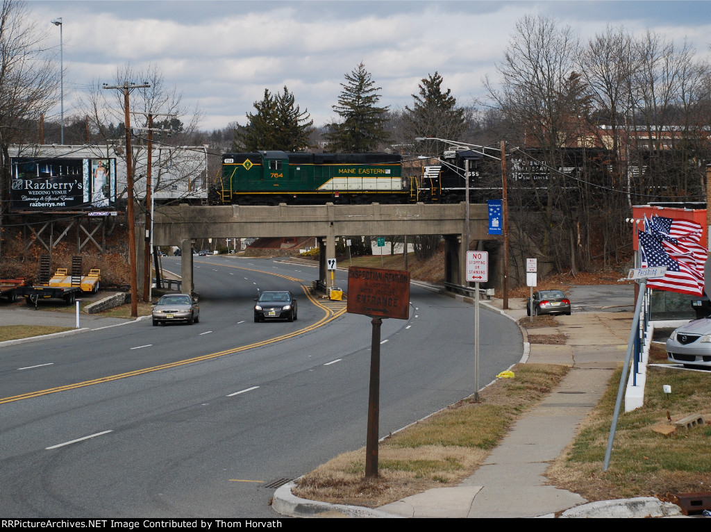 ME 764 passes over Route 31 as it nears the end to its travel on Sunday